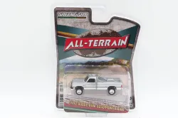 Greenlight Collectibles #35290-F 1:64 1992 Dodge Ram D250 Power Ram Lifted with Rollbar - Sterling Silver